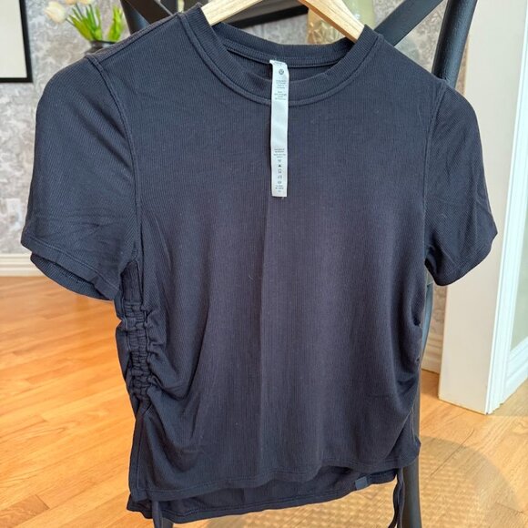 Black Lululemon side tie workout top *has bleach stain on back* LOW PRICE - Picture 1 of 4